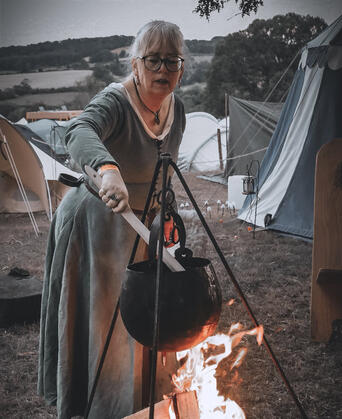 Sofia stirs up something for supper.